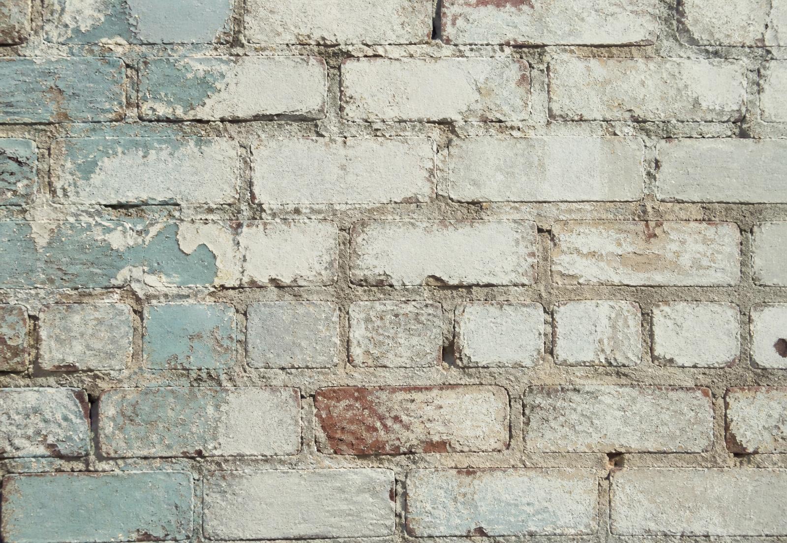 Weathered painted brick wall in NoDa, Charlotte
